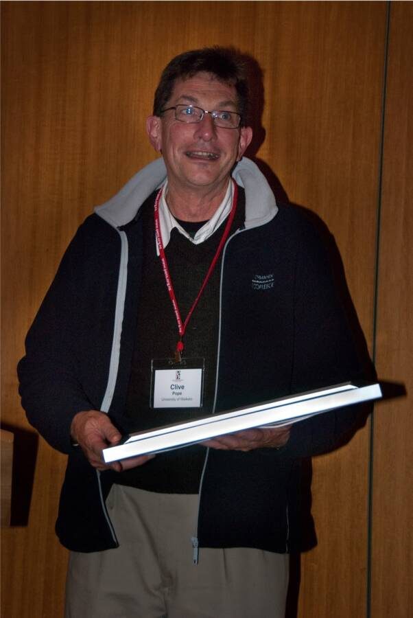 Clive Pope receiving an award